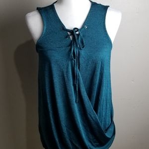 Jennifer Lopez  front tie sleeveless top s…